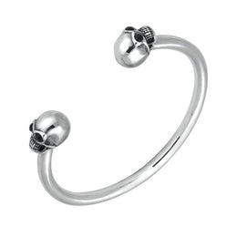 00090942 C W Sellors Sterling Silver Whitby Jet Medium Skull Torc Bangle. B849